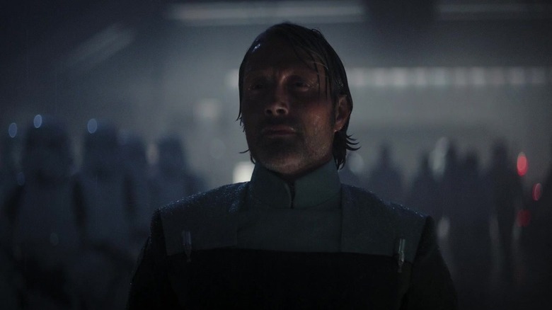 Galen Erso standing in the rain in Rogue One: A Star Wars Story