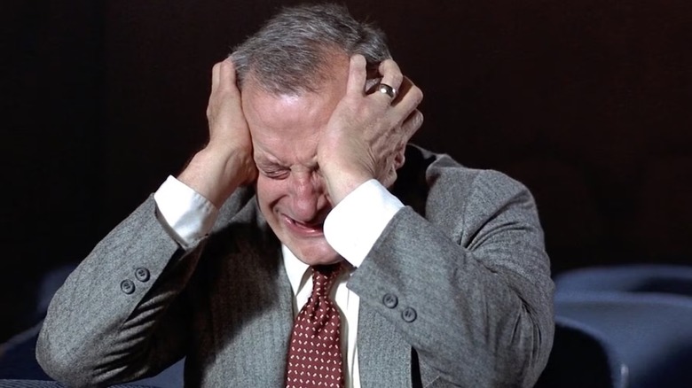 George C. Scott as Jake Van Dorn is anguished in a movie theater in Hardcore