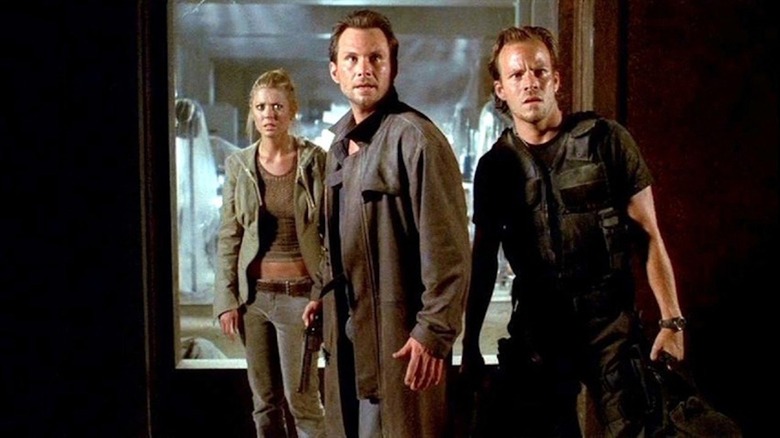 Tara Reid as Aline Cedrac, Christopher Slater as Edward Carnby and Stephen Dorff as Richard Burke exude confusion in a museum in Alone in the Dark