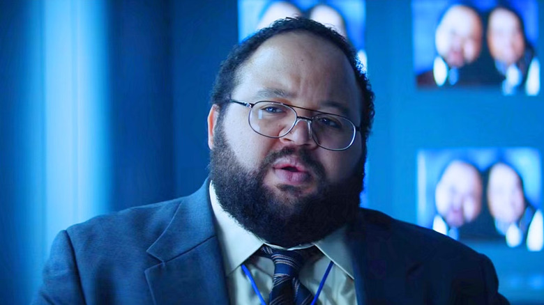 Zach Cherry as Dylan in Severance
