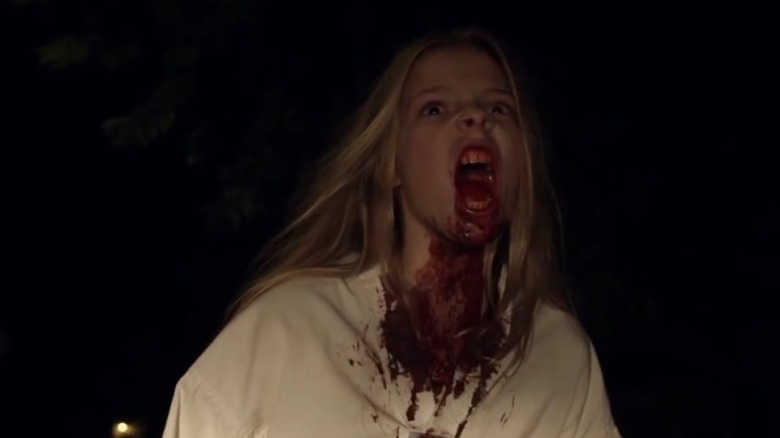 Lily screams after biting Fuches' face in Barry