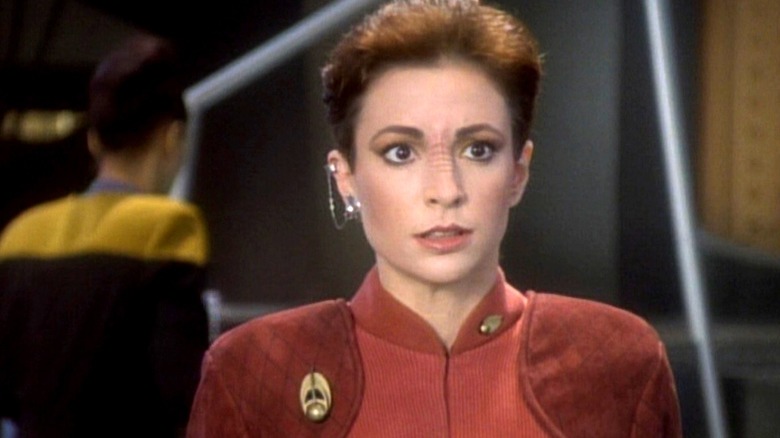 Kira looking startled in Ops on Star Trek: Deep Space Nine