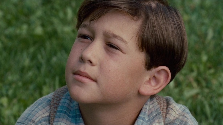 Joseph Gordon-Levitt's Norman Maclean is seen in closeup in A River Runs Through It