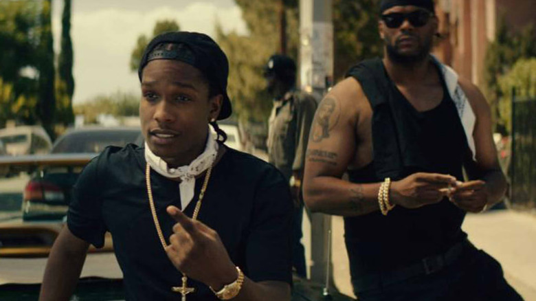 Dom outside on the street in Dope