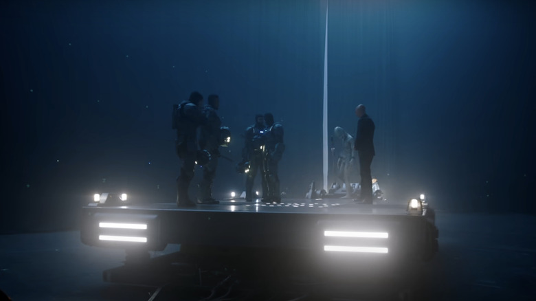 Nicholas Hoult's Lex Luthor stands on a platform alongside what looks like a White Martian in a behind the scenes shot from Superman