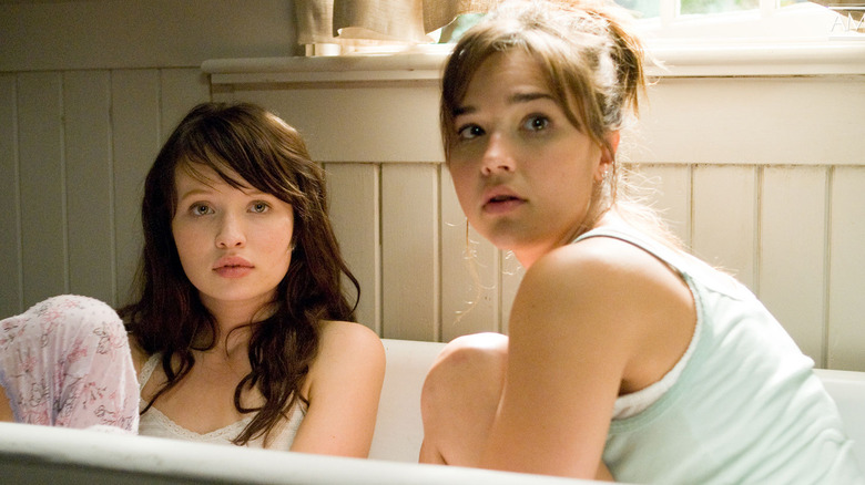 Anna and Alex stare in distress in The Uninvited