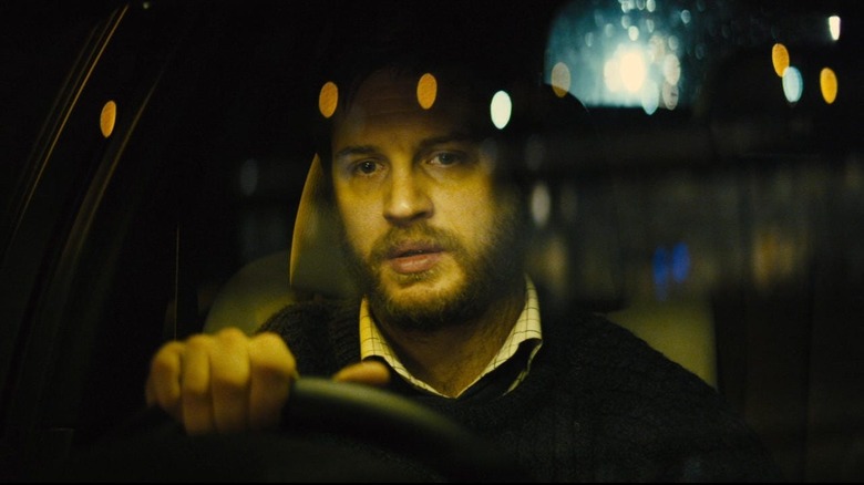 Ivan Locke looking forlorn as he drives his car in Locke