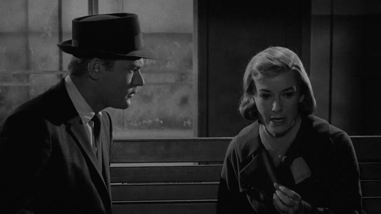 Vera Miles' Millicent Barnes sits opposite Martin Milner's Paul Grinstead on a bus station bench in The Twilight Zone