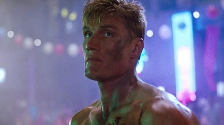 A close up of Dolph Lundgren as Sgt. Chris Kenner looking beat up in Showdown in Little Tokyo