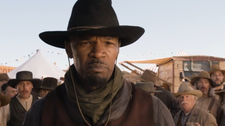 Django Freeman at the shooting exhibition on exhibition grounds in a million ways to die in the West