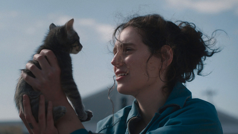 Agnes holding the cat she found in Sorry, Baby