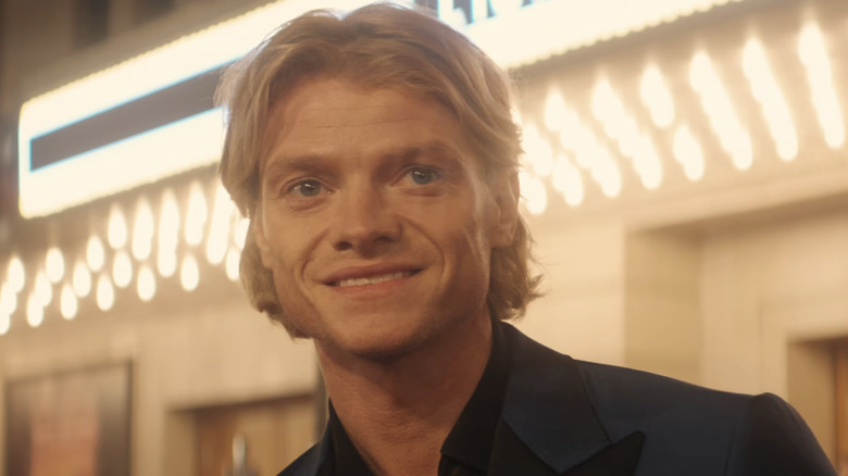 Matt Hagen's smiles at a premiere in Clayface