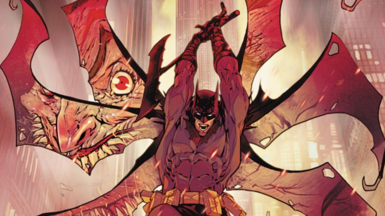 Absolute Batman #18 cover - Batman raising his axe with the Joker's face reflected in his cape