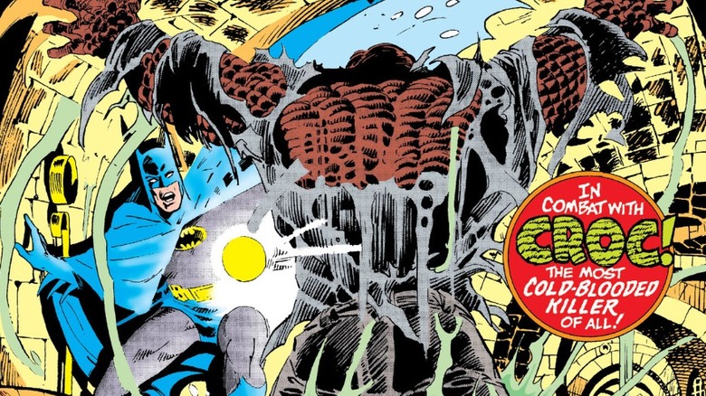 Detective Comics #525 cover - Batman in the sewers, holding flashlight, as Killer Croc leaps in front of him