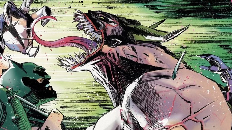 Absolute Batman cover by Clay Mann showing Batman grappling with the Joker in his monster form