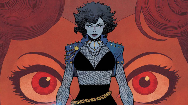 Absolute Wonder Woman #16 cover - Zatanna standing behind Wonder Woman's enlarged gaze