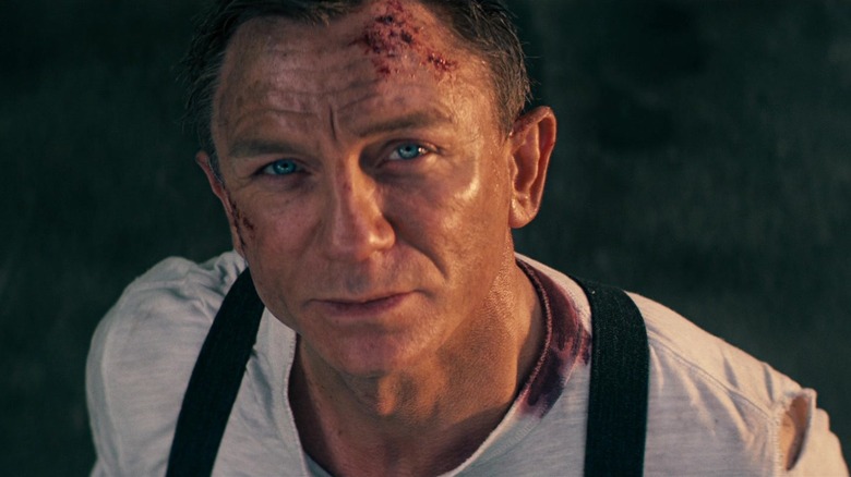 Daniel Craig as James Bond looking upwards in No Time to Die.jpg