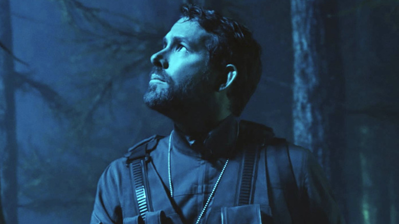 Ryan Reynolds looking up in The Adam Project