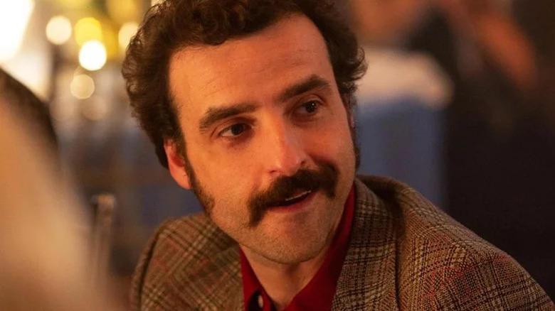 David Krumholtz with mustache and '70s suit in White House Plumbers