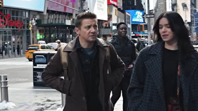 Jeremy Renner pointing his bow and arrow as Hawkeye in The Avengers