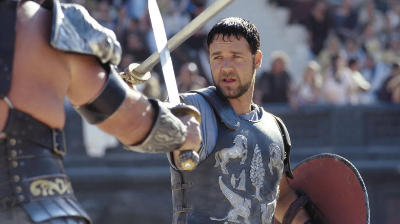 Maximus fighting with sword and shield in Gladiator
