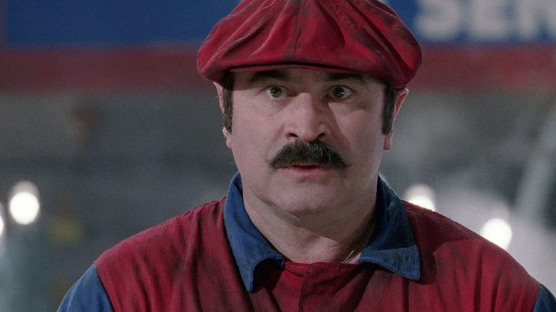 Bob Hoskins as Mario looking scared in Super Mario Bros.