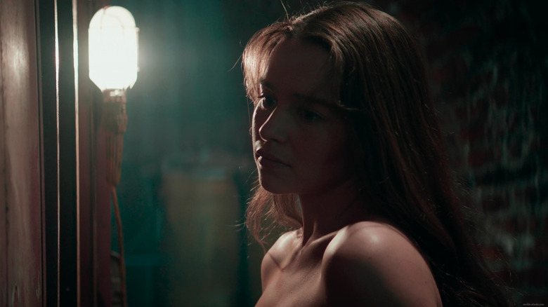 Emilia Clarke as Sarah Connor undressing in Terminator Genisys