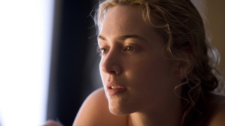 Kate Winslet as Hanna lying down in The Reader
