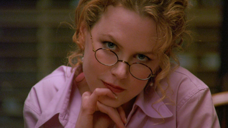Nicole Kidman as Alice wearing glasses and staring ahead in Eyes Wide Shut