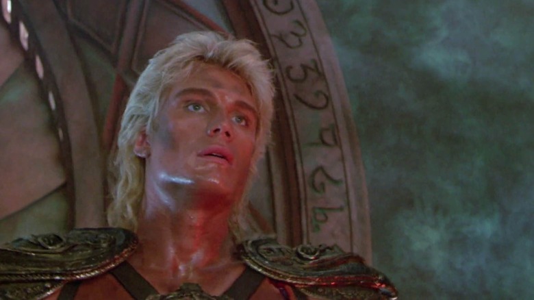 Dolph Lundgren as He-Man in Masters of the Universe, looking off frame