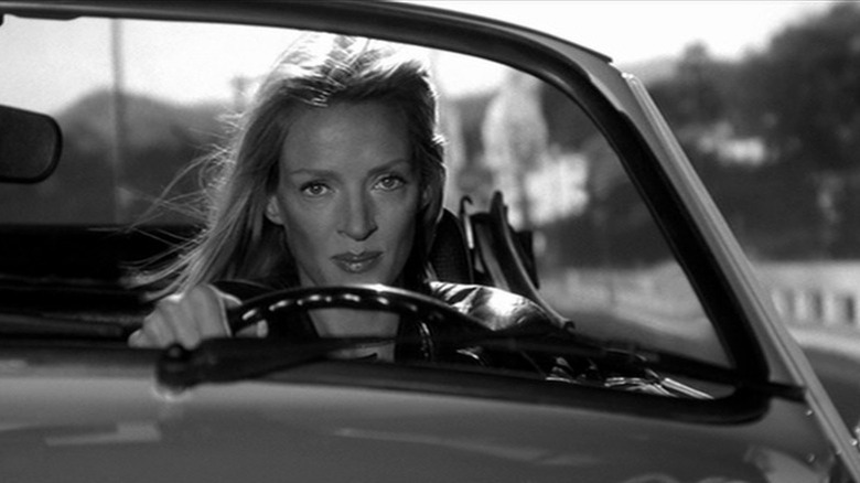 Uma Thurman driving away in Kill Bill Vol, 2