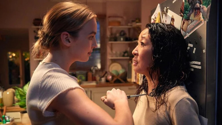 Villanelle holding a knife to Eve's chest