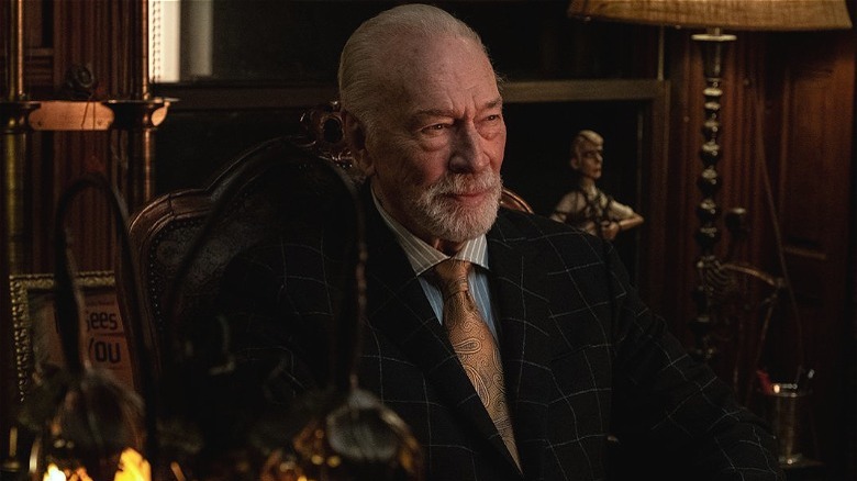 Harlan Thrombey considers his family
