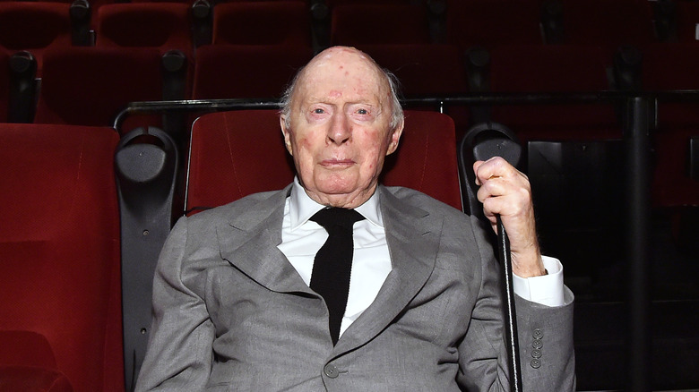 Norman Lloyd with his cane