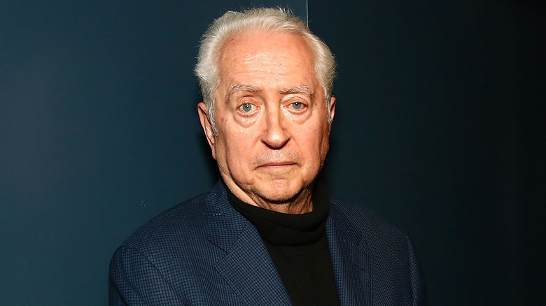 Robert Downey Sr. visits a premiere.