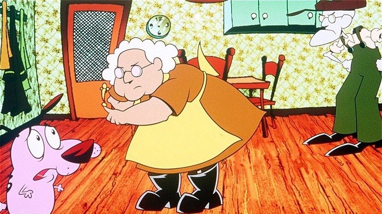 Muriel chasties Courage the dog