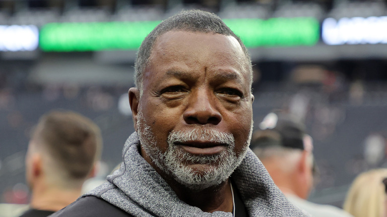 Carl Weathers wearing grey scarf