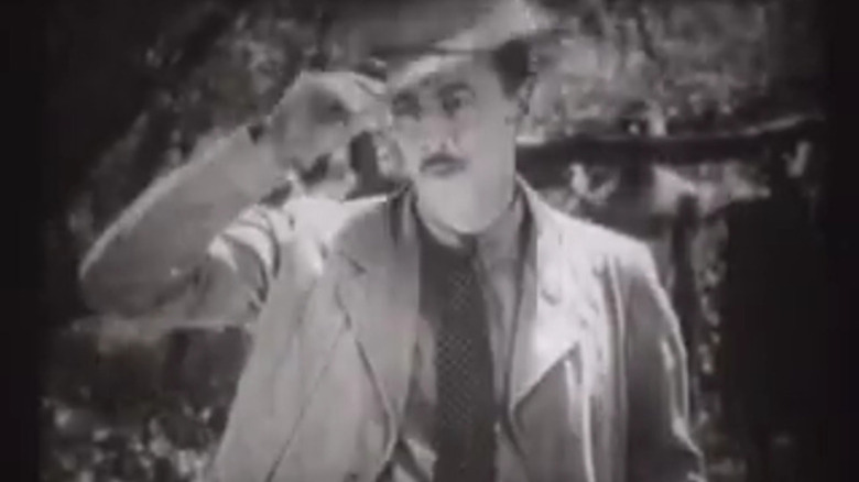 Gordon Standing tipping hat on King of the Jungle