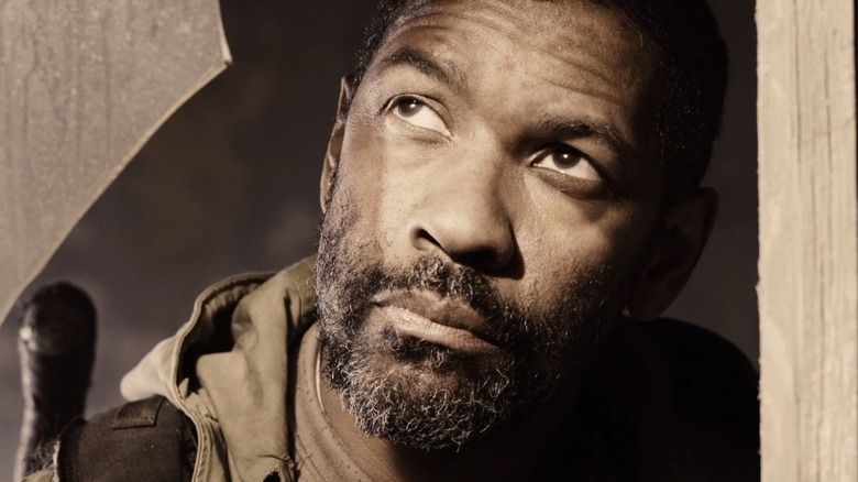 Denzel Washington as Eli looking up in The Book of Eli