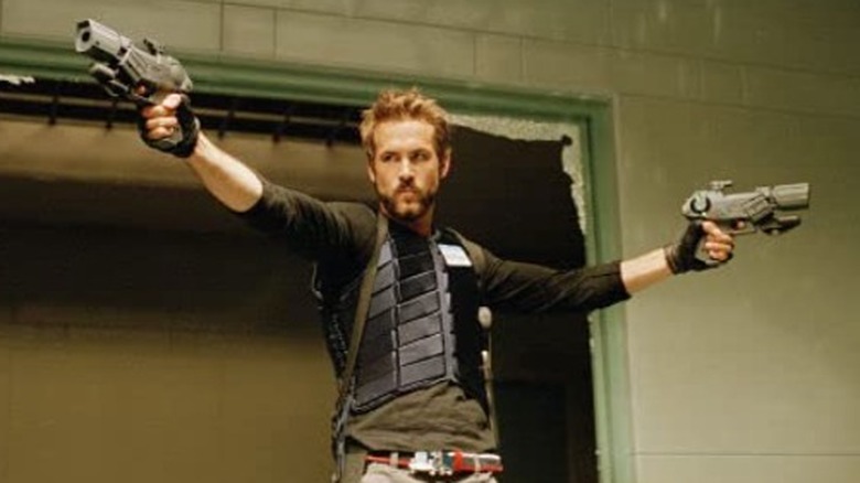 Ryan Reynolds guns vest Blade: Trinity