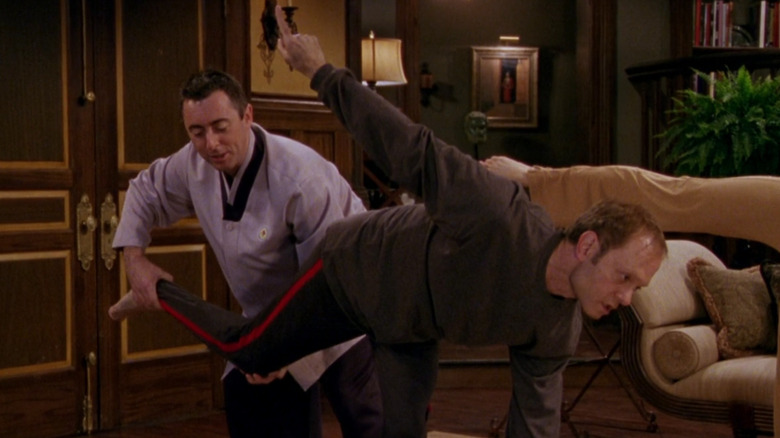 Alan Cumming and David Hyde Pierce try some new yoga poses as Ahmrit and Niles Crane in Frasier