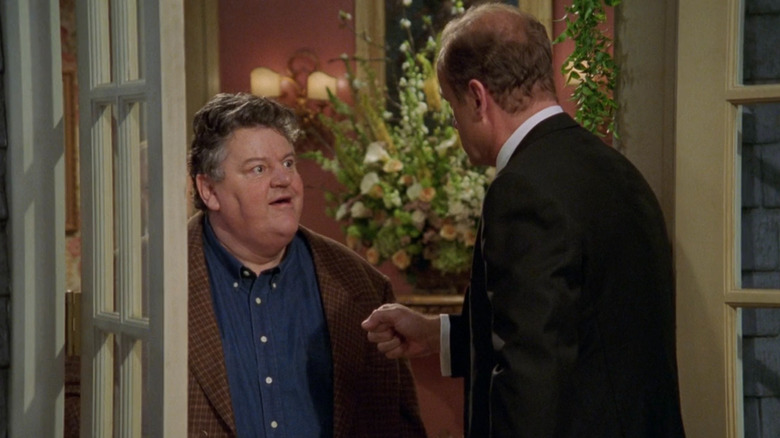 Robbie Coltrane as an excited Michael Moon before he fires off a cannon in Frasier