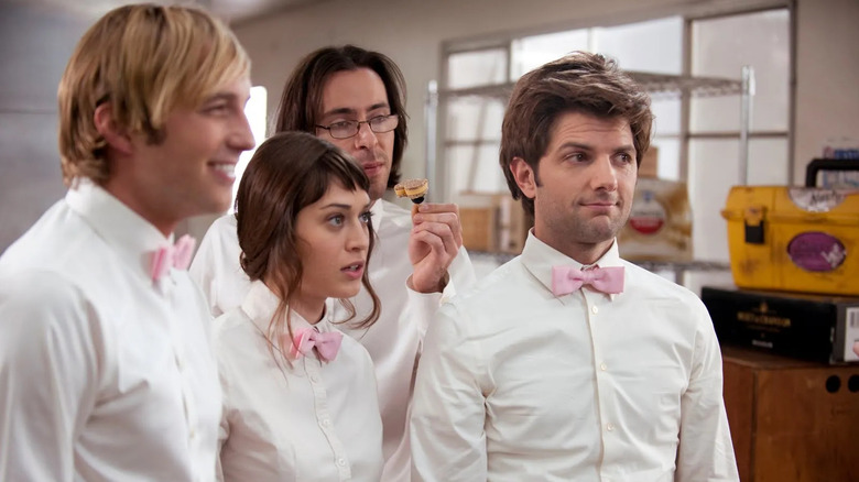 Kyle, Casey, Roman, and Henry in their uniforms in Party Down