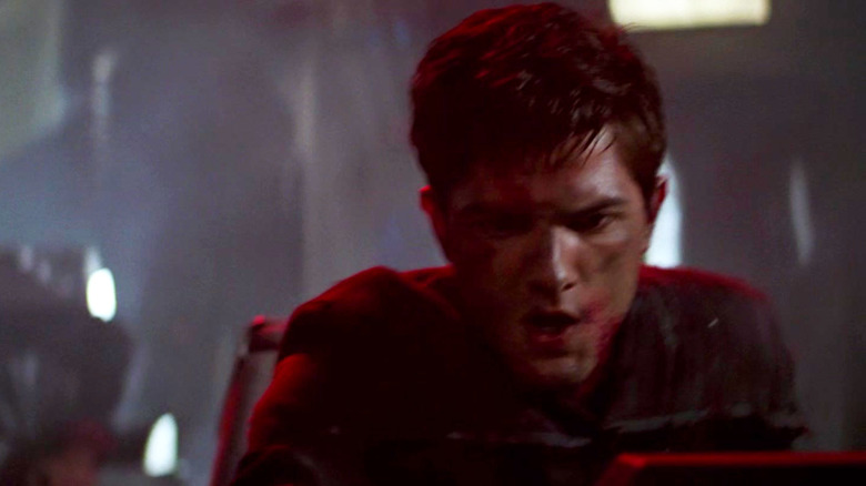 Adam Scott as Defiant Conn Officer looking intense in Star Trek: First Contact