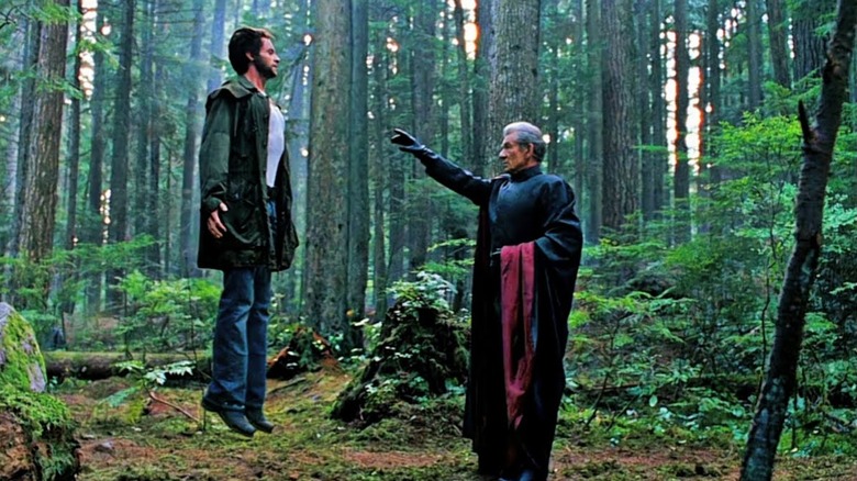 Magneto picking up Wolverine