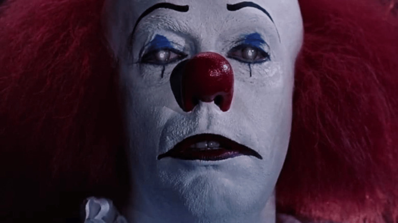 Tim Curry stars in Stephen King's It (1990)