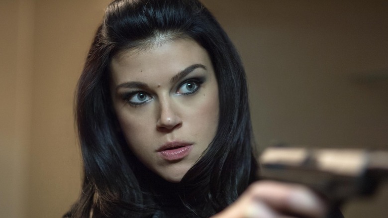 Adrianne Palicki as Ms. Perkins in John Wick
