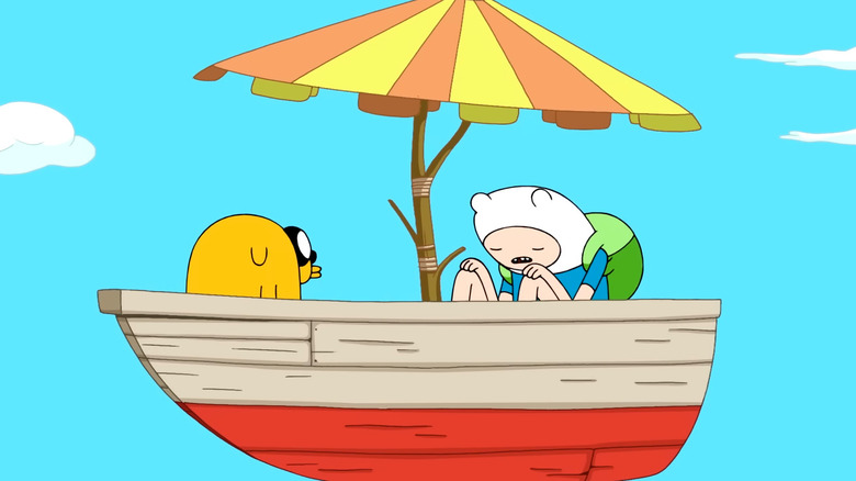 Finn closes his eyes in a boat with Jake on Adventure Time