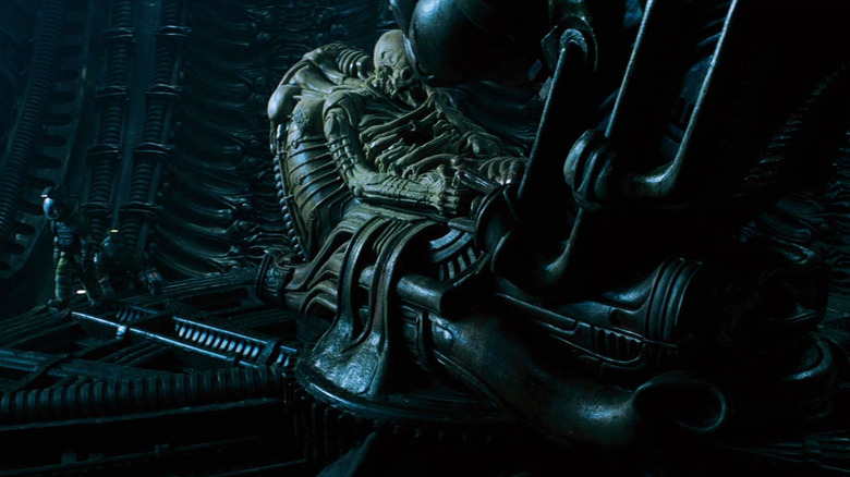 A wide shot of the Space Jockey in Alien