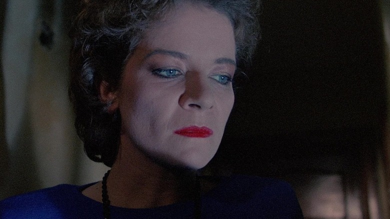 Julia (Clare Higgins) staring intensely in Hellraiser (1987)